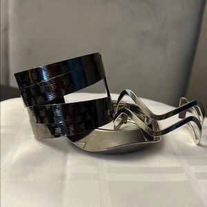 3 Silver colored Bracelets